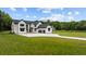 Beautiful new construction modern farmhouse with an attached two car garage on a spacious lot at 1604 Greendale Rd, Covington, GA 30014