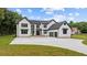Beautiful modern farmhouse with an attached two car garage on a spacious lot at 1604 Greendale Rd, Covington, GA 30014