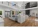 Spacious kitchen with large island and stainless steel appliances open to living space at 1604 Greendale Rd, Covington, GA 30014