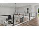 Open-concept view of a modern kitchen with an island and stainless steel appliances at 1604 Greendale Rd, Covington, GA 30014