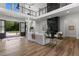 Open concept living space with a fireplace, high ceilings and access to the outdoors at 1604 Greendale Rd, Covington, GA 30014