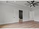 Spacious main bedroom with modern ceiling fan and ensuite bathroom access at 1604 Greendale Rd, Covington, GA 30014