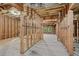 Unfinished basement featuring wood framing, exposed insulation, and a concrete floor ready for customization at 1917 Oak Grove Ne Rd, Atlanta, GA 30345