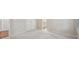 Open bedroom with carpet, neutral walls, with entry to the bathroom at 1917 Oak Grove Ne Rd, Atlanta, GA 30345