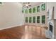 Bright living room features high ceilings, fireplace, and wall of windows at 1917 Oak Grove Ne Rd, Atlanta, GA 30345