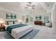 Spacious main bedroom features a trey ceiling, a ceiling fan, and natural lighting at 1917 Oak Grove Ne Rd, Atlanta, GA 30345