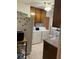 Efficient kitchen space with essential appliances and convenient washer/dryer hookups at 2530 Old Colony Rd, East Point, GA 30344