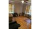 Functional living room with hardwood floors, complemented by neutral walls and natural light at 2530 Old Colony Rd, East Point, GA 30344