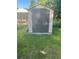 Gray storage shed with double doors in the backyard at 2530 Old Colony Rd, East Point, GA 30344