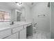 Well-lit bathroom with white vanity and tile flooring at 4426 High Gate Nw Dr, Acworth, GA 30101