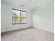 Bright bedroom featuring neutral carpet and a sun-drenched window at 4426 High Gate Nw Dr, Acworth, GA 30101