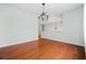 Spacious dining area with hardwood floors and a chandelier, perfect for hosting gatherings and special occasions at 4426 High Gate Nw Dr, Acworth, GA 30101