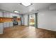 Spacious kitchen with stainless appliances, light grey cabinets, and wooden backsplash at 4426 High Gate Nw Dr, Acworth, GA 30101