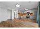 Spacious kitchen with stainless appliances, light grey cabinets, and wooden backsplash at 4426 High Gate Nw Dr, Acworth, GA 30101