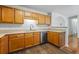 Functional kitchen showcases wood cabinets, stainless steel appliances, and durable countertops for daily use at 4426 High Gate Nw Dr, Acworth, GA 30101