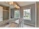 Bathroom with double vanity and large mirror at 450 Hilingdon Way, Suwanee, GA 30024