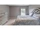 Bedroom with large window and dresser at 450 Hilingdon Way, Suwanee, GA 30024