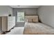 Bedroom with a white dresser and window at 450 Hilingdon Way, Suwanee, GA 30024