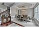 Dining room featuring modern chandelier and wainscoting at 450 Hilingdon Way, Suwanee, GA 30024