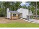 Inviting two-story home featuring a cozy front porch and a neatly landscaped yard at 4847 Royal Dr, Duluth, GA 30096