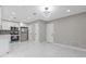 Open concept kitchen featuring stainless steel appliances and marble floors at 4847 Royal Dr, Duluth, GA 30096