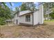 This home has fresh white siding and black trim, with a yard ready for landscaping at 4847 Royal Dr, Duluth, GA 30096