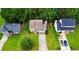 Beautiful property with well-maintained lawn and mature trees and long driveway at 1012 Chapman Cir, Stone Mountain, GA 30088