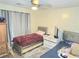 Bedroom featuring decor, ceiling fan, and two beds at 1012 Chapman Cir, Stone Mountain, GA 30088