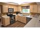 Functional kitchen featuring updated appliances, ample counter space, and a convenient layout at 1012 Chapman Cir, Stone Mountain, GA 30088