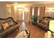 Cozy living room with hardwood floors, decorative lighting, and comfortable seating arrangement at 1012 Chapman Cir, Stone Mountain, GA 30088