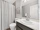 Bathroom featuring modern vanity and shower with curtain at 4941 Lighthouse Pointe, Acworth, GA 30101