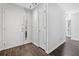 Welcoming entryway features a coat closet and wood-look floors at 4941 Lighthouse Pointe, Acworth, GA 30101
