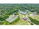 From this aerial shot, tennis courts, a clubhouse and other sports facilities can be seen at 50 Biscayne Dr # 2106, Atlanta, GA 30309