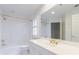 Bathroom with a shower over tub, white vanity and mirror reflecting the bathroom at 50 Biscayne Dr # 2106, Atlanta, GA 30309