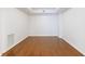 Versatile empty room with hardwood floors, perfect for customization at 50 Biscayne Dr # 2106, Atlanta, GA 30309