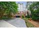 Beautiful condo exterior featuring lush landscaping and a private entrance at 50 Biscayne Dr # 2106, Atlanta, GA 30309