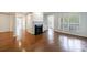 Bright living room with hardwood floors, fireplace, and large windows at 50 Biscayne Dr # 2106, Atlanta, GA 30309