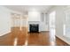 Spacious living area featuring a fireplace, built-in shelving, and ample natural light at 50 Biscayne Dr # 2106, Atlanta, GA 30309