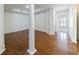 Expansive living area with hardwood floors, and columns at 50 Biscayne Dr # 2106, Atlanta, GA 30309