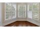 Windowed breakfast nook area with white shutters and hardwood floors at 50 Biscayne Dr # 2106, Atlanta, GA 30309