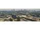 Expansive aerial view capturing the dynamic skyline, vast greenery, and urban landscape of a vibrant city at 940 Longley Nw Ave, Atlanta, GA 30318