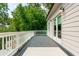 Deck showcasing a view of the backyard and lush trees, with French doors leading inside at 940 Longley Nw Ave, Atlanta, GA 30318