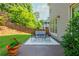 Backyard with a well-manicured lawn, patio seating, and lush landscaping for outdoor enjoyment at 940 Longley Nw Ave, Atlanta, GA 30318