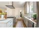 Contemporary kitchen featuring quartz countertops, stainless appliances, and modern cabinetry at 940 Longley Nw Ave, Atlanta, GA 30318