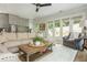 Relaxing living room featuring neutral decor and a view towards the outdoor foliage at 940 Longley Nw Ave, Atlanta, GA 30318