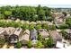 Aerial view of homes in a quaint neighborhood community with mature trees and a mix of architectural styles at 980 Faith Se Ave, Atlanta, GA 30316