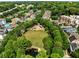 Overhead shot showcases the community park featuring playground, open green space, and a pond at 980 Faith Se Ave, Atlanta, GA 30316
