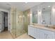 Beautiful bathroom with frameless glass shower, double vanity, and marble-tiled floors for a clean aesthetic at 980 Faith Se Ave, Atlanta, GA 30316