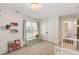Bright room with storage bench, window views and decor creating a cheerful atmosphere at 980 Faith Se Ave, Atlanta, GA 30316