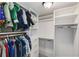 Walk-in closet with custom shelves, drawers, and ample hanging space for organization at 980 Faith Se Ave, Atlanta, GA 30316